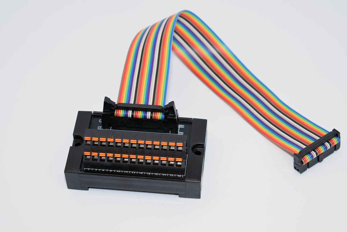 CreativeOBD 26-way IDC breakout board with numbered push-button terminals and multicoloured ribbon cable