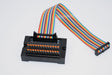 CreativeOBD 26-way IDC breakout board with numbered push-button terminals and multicoloured ribbon cable