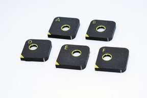 Korhex positioning mask set containing masks A, B, D, E and F; Mask C is not included