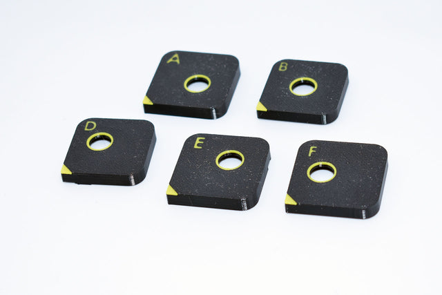 Korhex positioning mask set containing masks A, B, D, E and F; Mask C is not included
