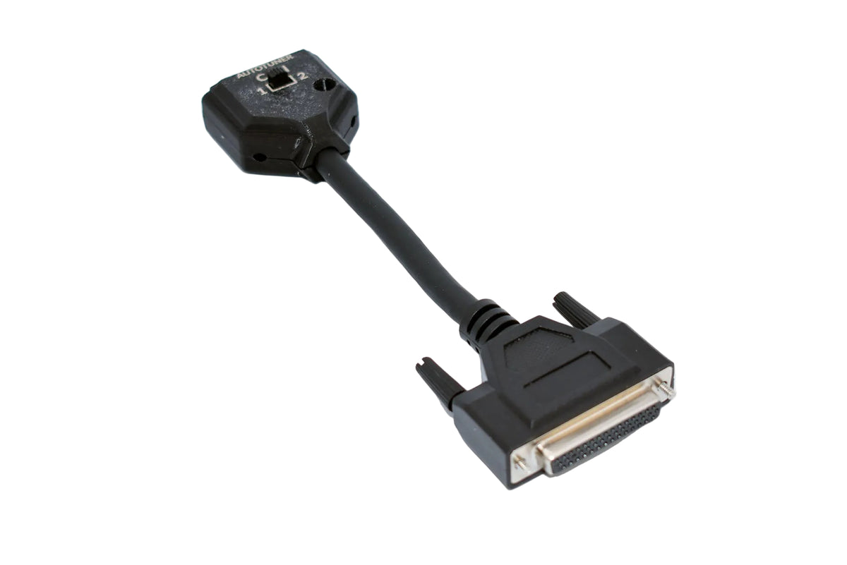 The Genius to Autotuner adapter showing the Dimsport tool connection and Autotuner bench cable connection